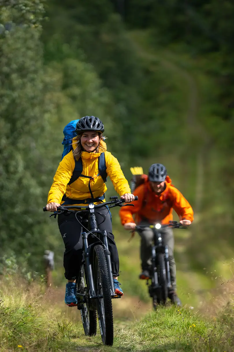 Young couple on a bike ride along the historic Kongevegen