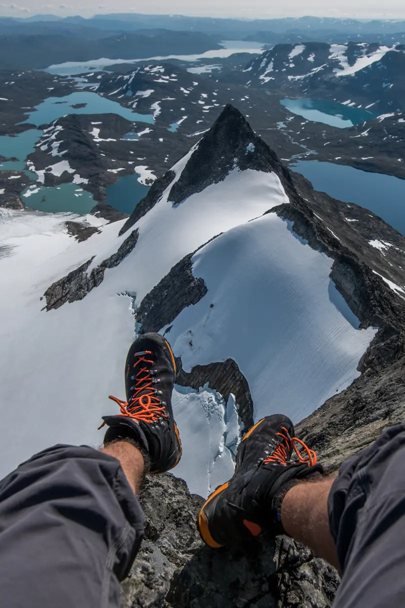 Summit hike with guide from Tyin Aktiv – participant enjoys the view from the top of Uranostind