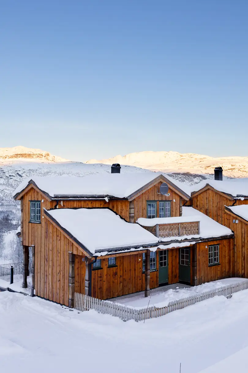 Eksteriør av leilighetene på Filefjellstuene i vinterdrakt