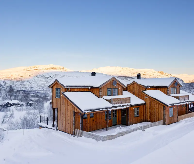 Eksteriør av leilighetene på Filefjellstuene i vinterdrakt