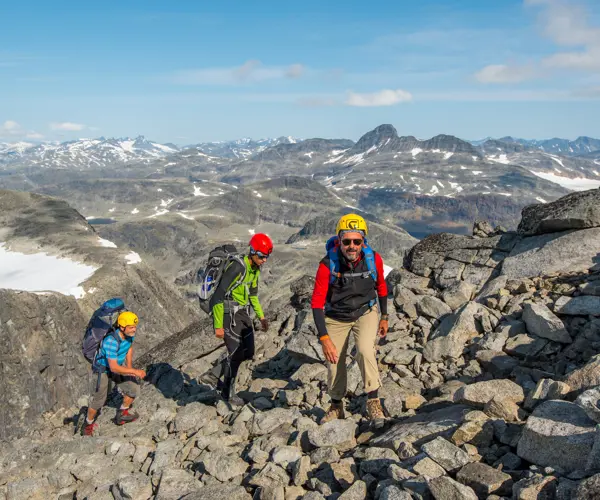 Summit hike with guide – participants heading towards Falketind with Tyin Aktiv