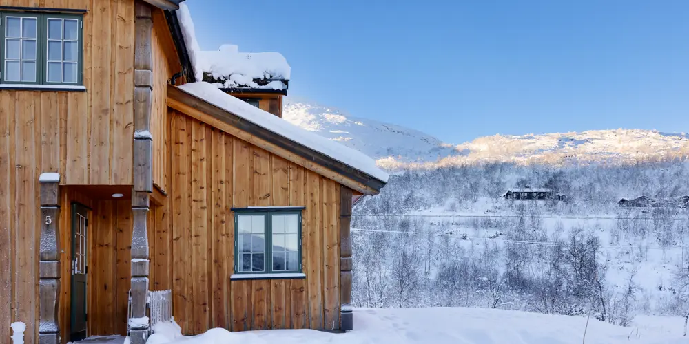 Eksteriør av leilighetene på Filefjellstuene i vinterdrakt