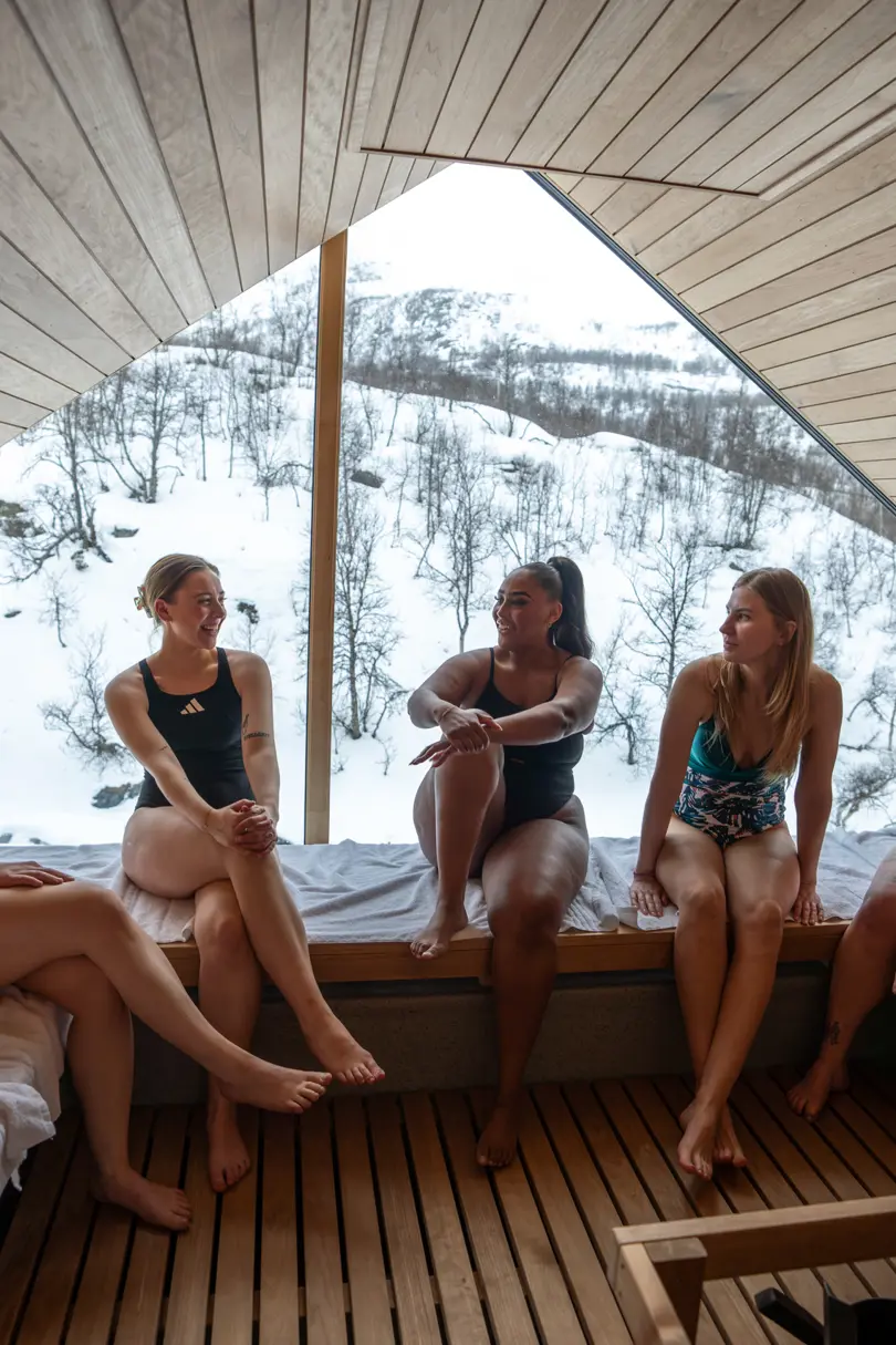 Friends enjoying a sauna at Filefjellstuene on a winter day
