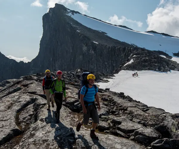 Summit hike with guide – participants heading towards Falketind with Tyin Aktiv