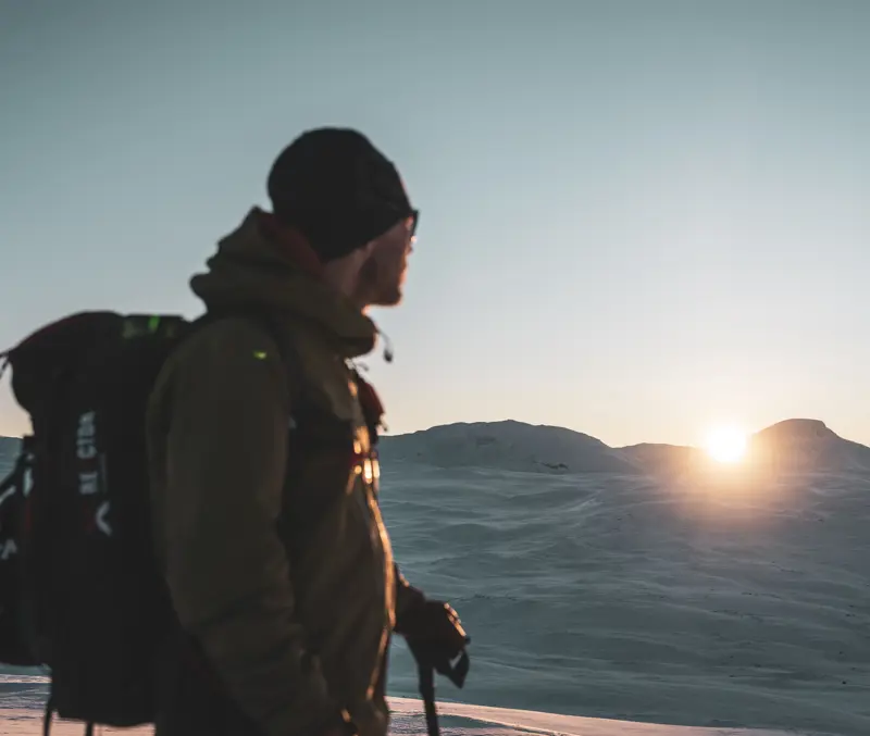 Skier in the winter sun at Tyin Filefjell